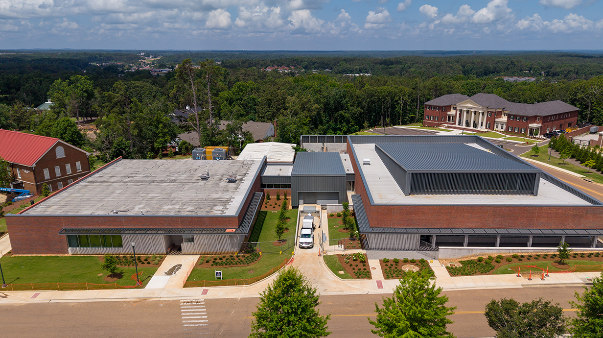 Aerial photo of two large buildings.
