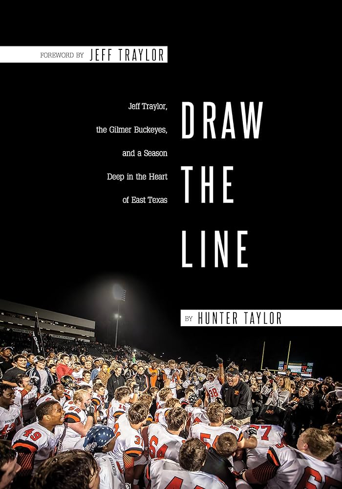 a coach talks with a football team after a came and the words Draw the Line