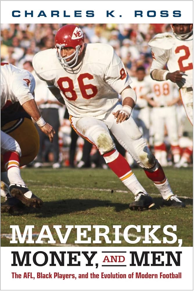 book cover of a football playing actively playing a game