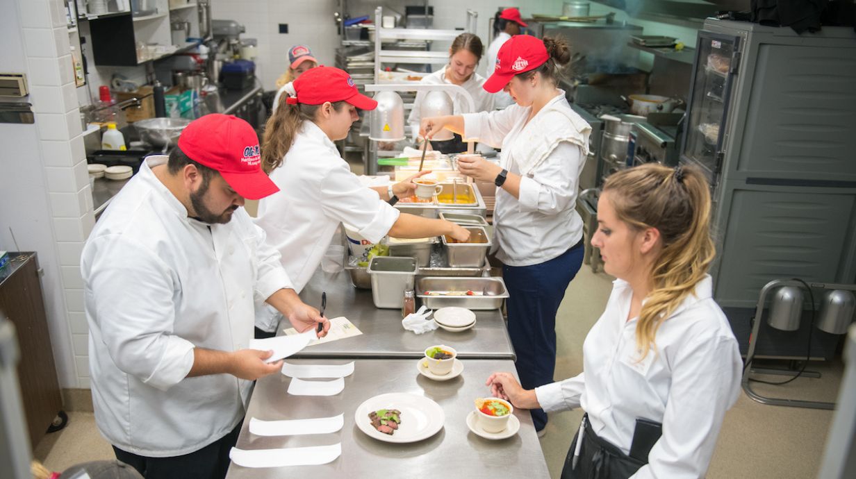 Ph.D. in Nutrition and Hospitality Management students prepare food in Lorraine Hall