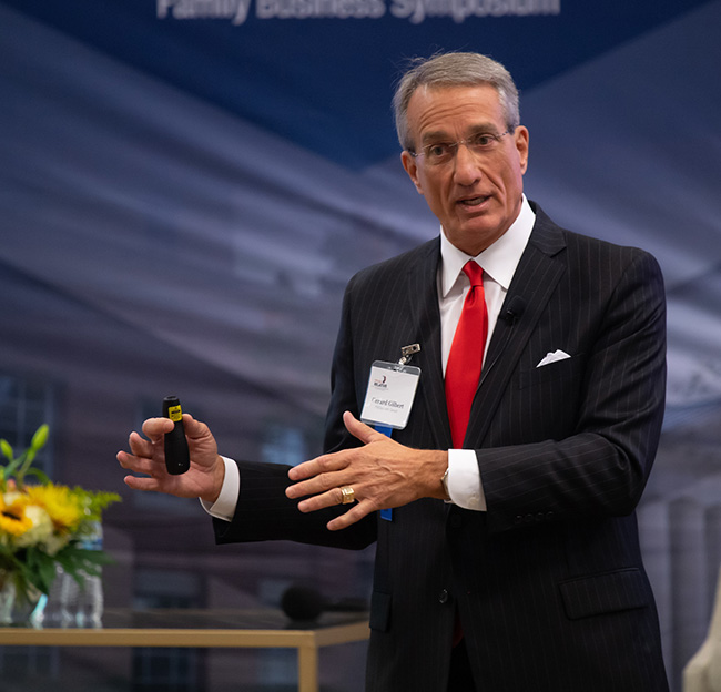 An alumnus speaks at a School of Business event