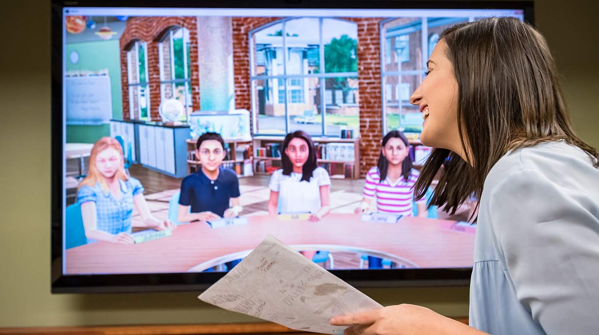 Teacher candidate practices a lesson with TeachLive technology