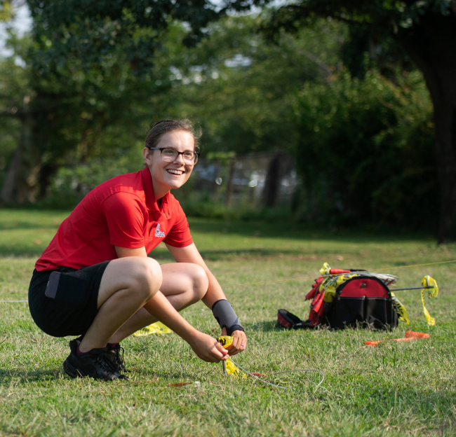 Graduate student placing sensors in Washington D.C. 