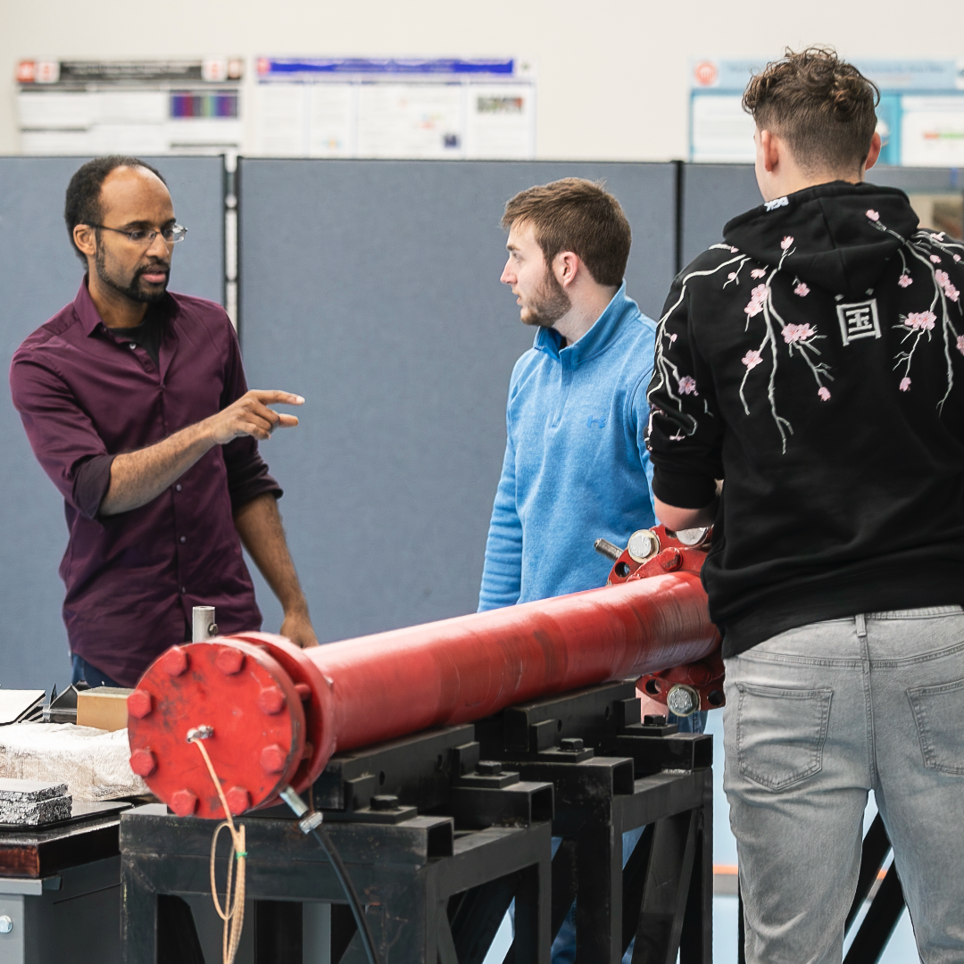 Mechanical engineering professor and students in the University's blast lab
