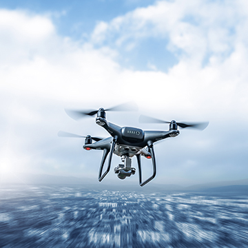 photo illustration of a drone flying