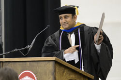 Upon receiving his  Teacher of the Year award at commencement, Soumyajit Majumdar tells the crowd what the award means to him