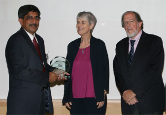 Barbara O. Schneeman, director of the Center for Food Safety and Applied Nutrition's Office of Nutrition, Labeling and Dietary Supplements, and Michael M. Landa (right), CFSAN director, present the Director's Special Citation Award to Ikhlas Khan for his support of their programs. 