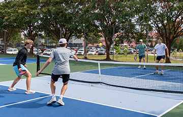 students playing pickleball