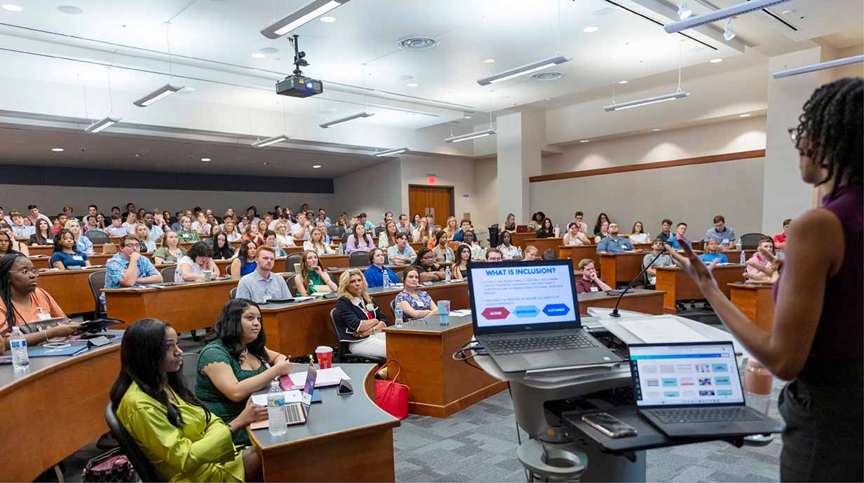 New Ole Miss law students fill a classroom during orientation.